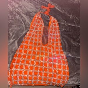 this is an orange Fashionova dress filled with rhinestones, and is a 2xl